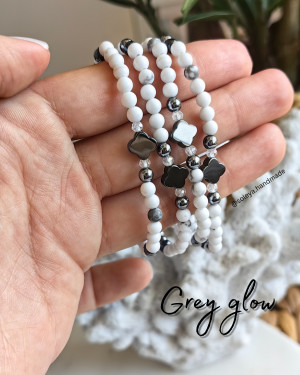 Grey glow - стилна гривна от терахерц, хаулит и хематит и стъклени мъниста на ластична корда